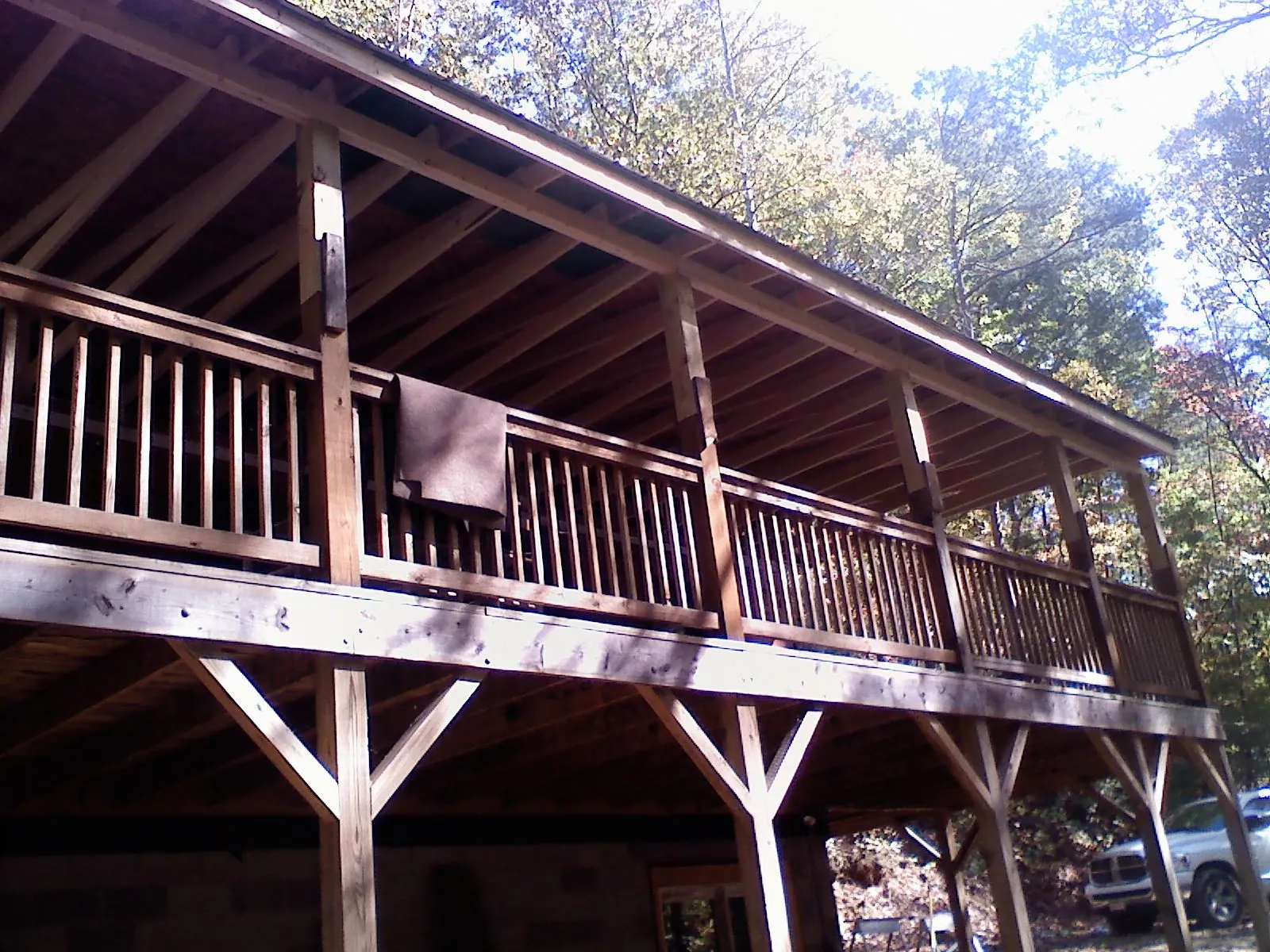 Timber framing under a new elevated porch and deck — Roof Leak Repair in Willow Wood by Roofing Brothers